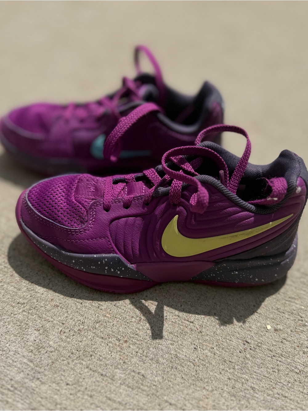 Nike Kids Purple Sneakers with Yellow Swoosh